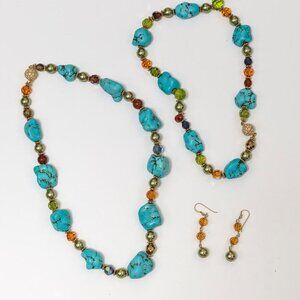 Two reconstituted turquoise necklaces and earrings